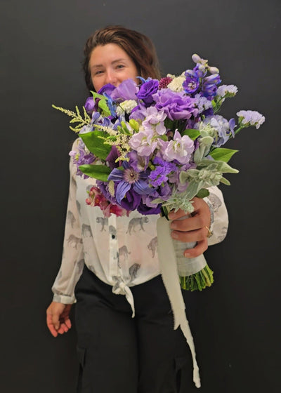 bride mauve lavender bouquet of purple flowers bridal wedding prom garden style